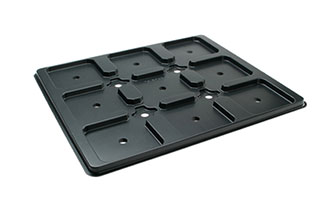 A rectangular black plastic pallet tray with multiple square and rectangular indentations.