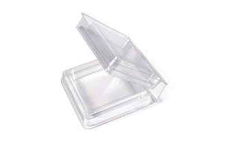 A transparent, empty plastic container with a hinged lid open at an angle, showing both the base and the cover.