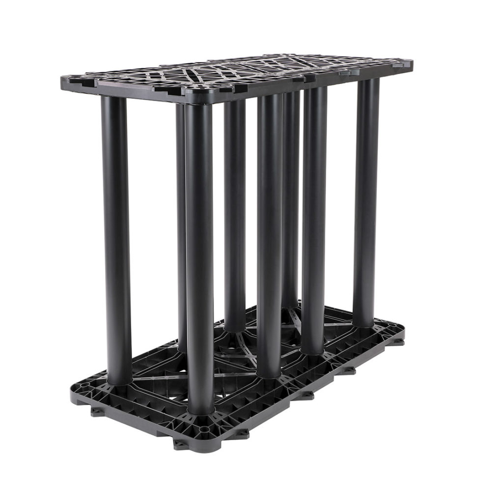 A black, rigid plastic structure with a rectangular grid-like top and bottom connected by multiple vertical cylindrical columns. This is the StormTank Module 20 Series.